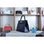 Kelly 28 black gold buckle with extreme pink French sheepskin inside